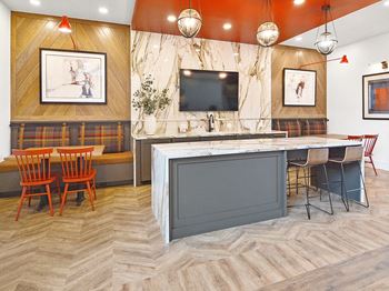 Bar, kitchen, and dining area